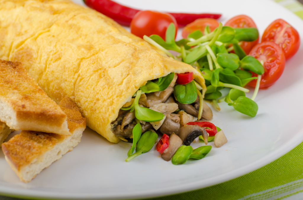 Omelette stuffed with mushrooms and microgreens Omelette stuffed with mushrooms and microgreens